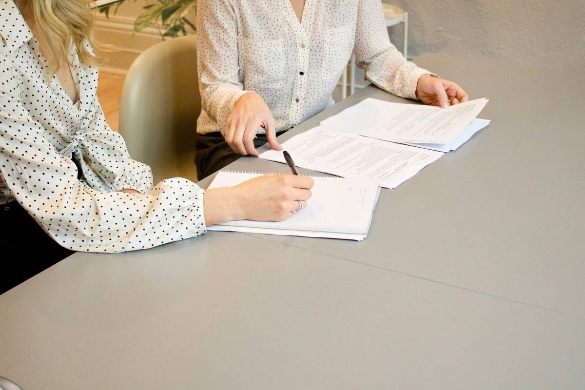 Maryland homeowner reviewing insurance quote mold rem options with agent